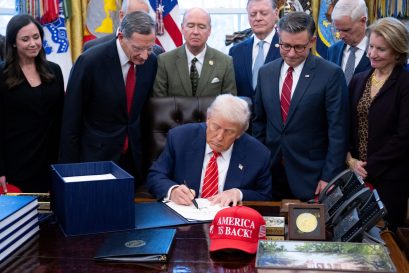 US President Donald Trump signs a funding bill to end a partial government shutdown in the Oval Office of the White House in Washington, DC, on February 3, 2026. The US House of Representatives passed a spending bill on Tuesday ending the four-day partial government shutdown sparked by Democratic opposition to funding for the federal agency carrying out President Donald Trump's immigration crackdown. (Photo by SAUL LOEB / AFP)