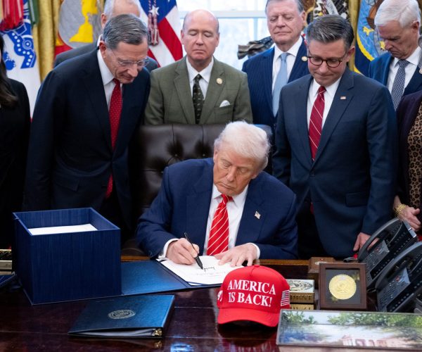 US President Donald Trump signs a funding bill to end a partial government shutdown in the Oval Office of the White House in Washington, DC, on February 3, 2026. The US House of Representatives passed a spending bill on Tuesday ending the four-day partial government shutdown sparked by Democratic opposition to funding for the federal agency carrying out President Donald Trump's immigration crackdown. (Photo by SAUL LOEB / AFP)