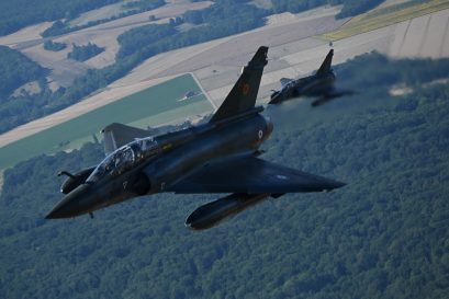Mirage 2000 fighter jets  fly to Paris to take part in the  the Bastille Day military parade over the Champs-Elysees avenue, on July 14, 2022. (Photo by Christophe SIMON / AFP)