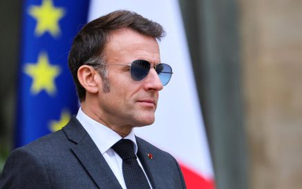 French President Emmanuel Macron wears sunglasses as he waits for the arrival of a guest at the Elysee Palace in Paris, France, January 23, 2026. REUTERS/Sarah Meyssonnier