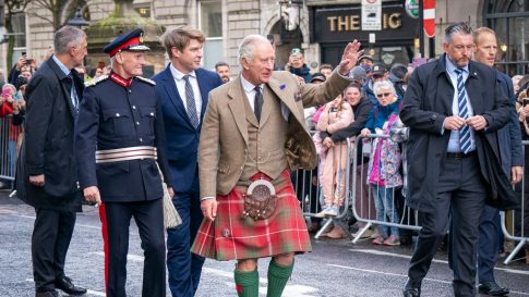 Britain's King Charles III (C) waves to members of the public during a visit to Aberdeen, on October 17, 2022. (Photo by Jane Barlow / POOL / AFP)